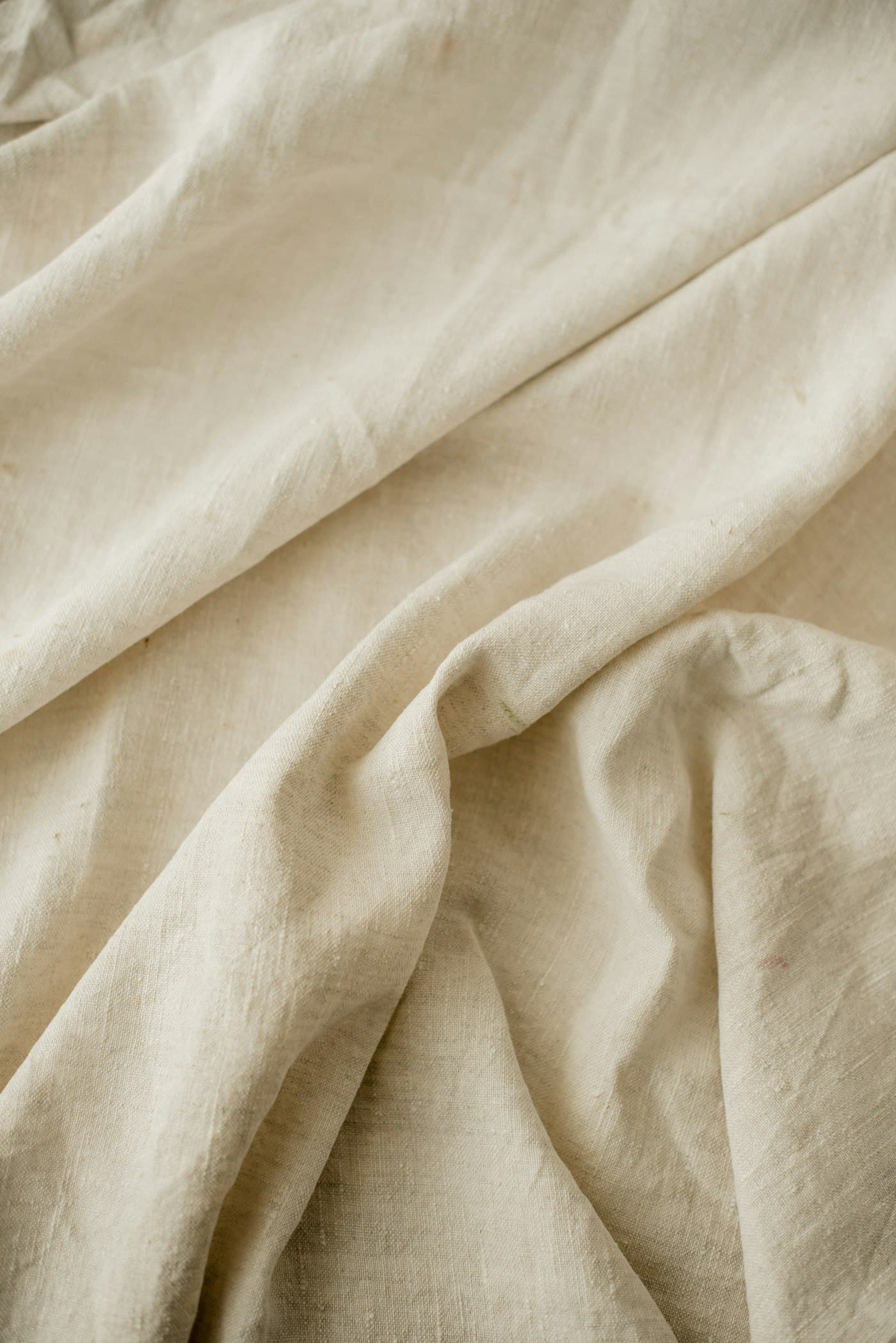 Close-up of woven lounge fabric showing its weight and drape